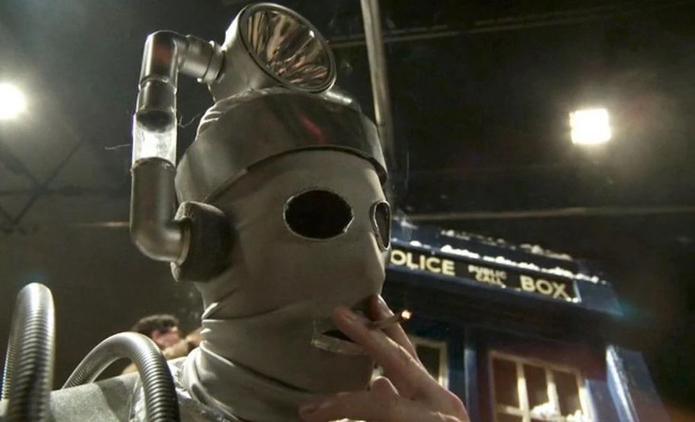 A still of a Mondasian Cyberman smoking 