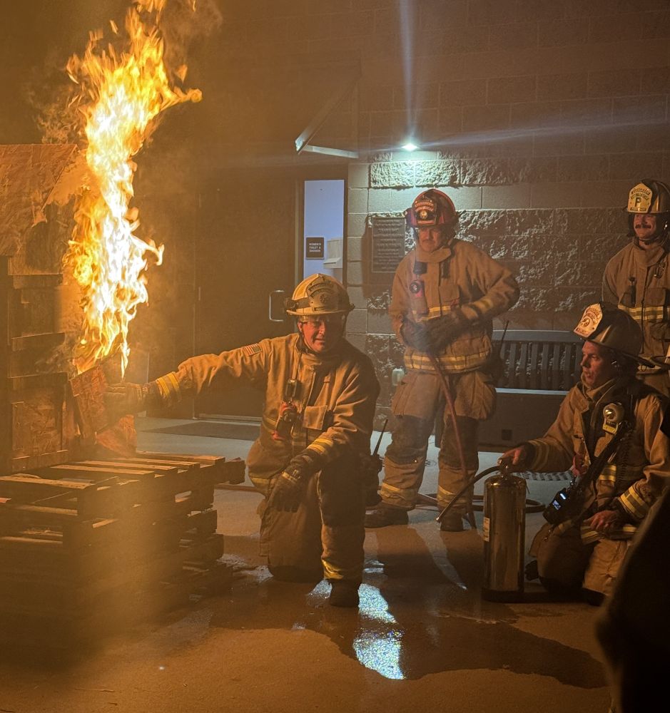 Firefighters learn about fire behavior