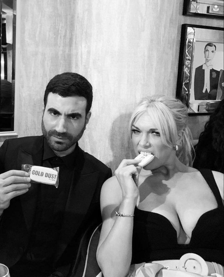 Brett Goldstein and Hannah Waddingham, biting biscuits at the People's Choice Awards.