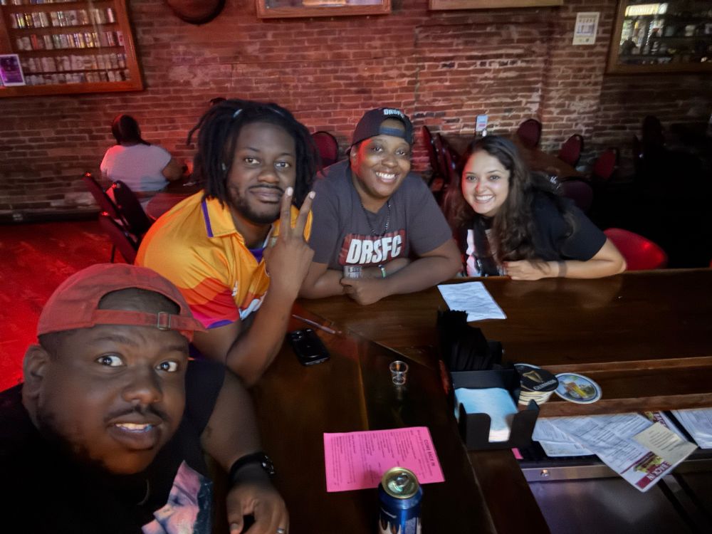 Yogi, Kyle, Eboni , and Diana at a bar in Madison 