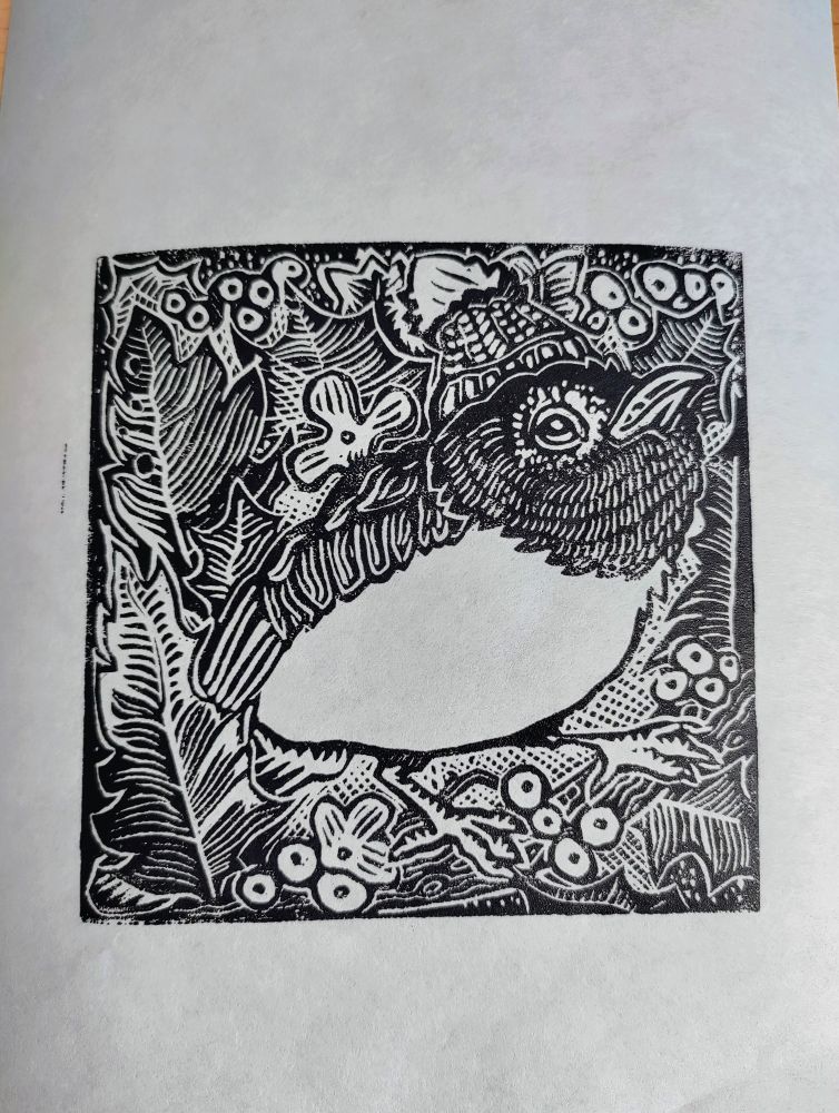 Bird with a hat in the middle of leaves. Black and white linocut 