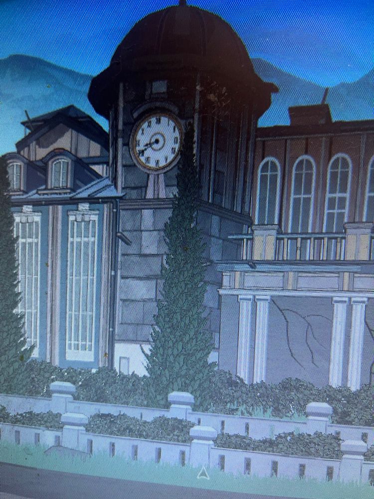 A camera photo of a monitor showing the clock tower in Blue Prince, which is not yet on 9:00