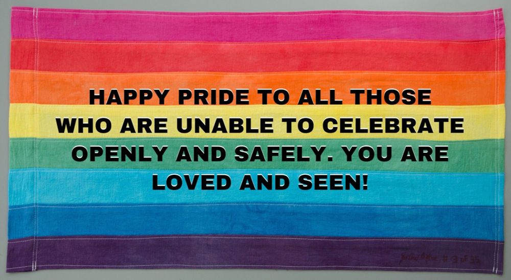 [ID: the Gilbert Baker pride flag with the words “Happy pride to all those who are unable to celebrate openly and safely. You are loved and seen!” in all-caps black text over it. end ID]