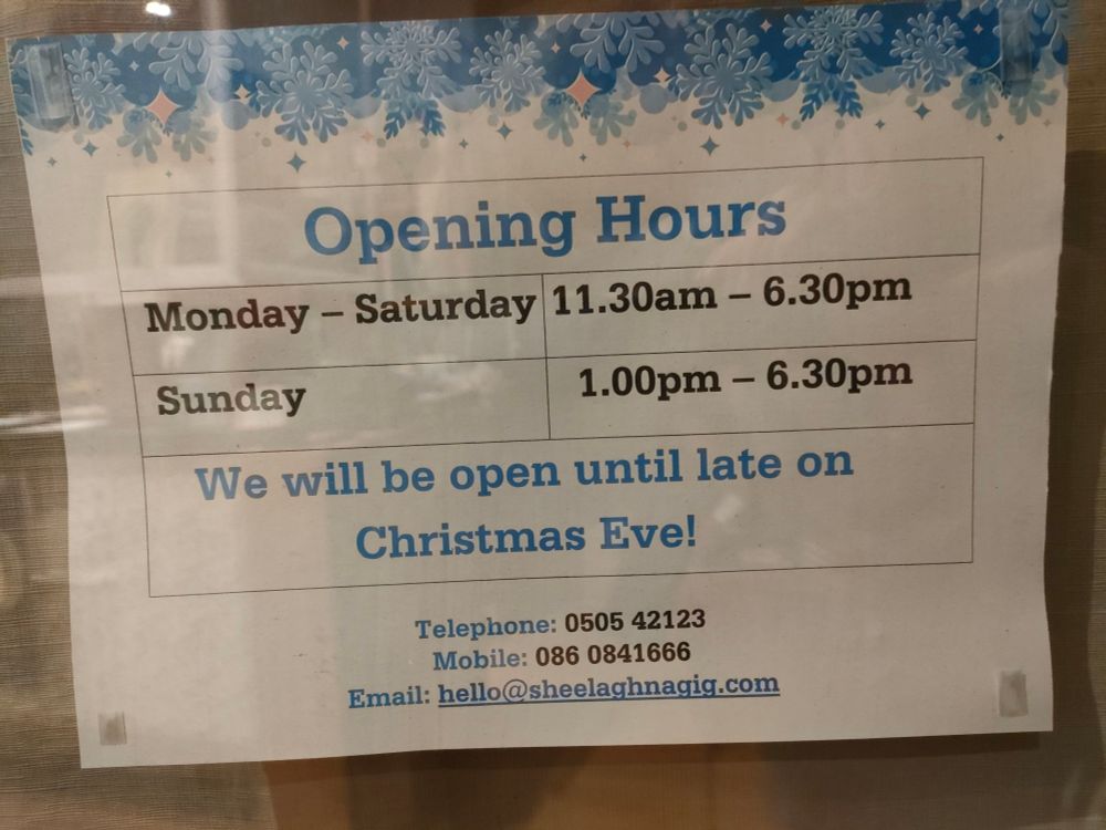 A poster showing the Christmas opening hours for Sheelagh na Gig bookshop. The table says: Opening hours Monday-Saturday 11.30am-6.30om, Sunday 1pm-6.30pm.