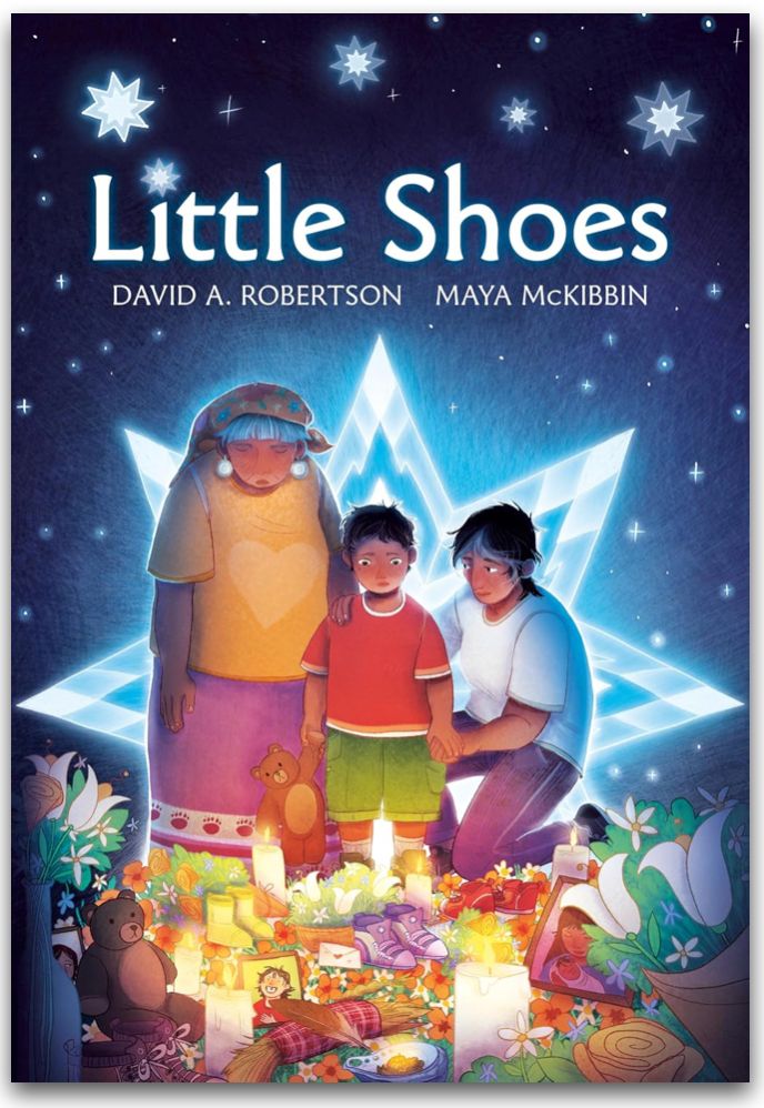 Book cover of Little Shoes by David A. Robertson and Maya McKibbin. Cover shows a family standing before a memorial of shoes, teddy bears, flowers, etc. with a background of a night sky with stars