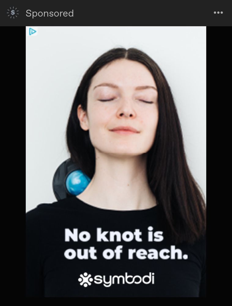 A sponsored tumblr ad with a woman using a massager device on her neck. Her eyes are closed and she is smiling. The tagline for the ad reads, "no knot is out of reach."