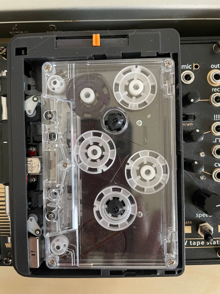 cassette tape with multiple tape wheels instead of just two. 