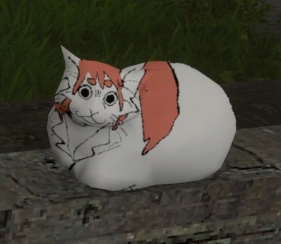 Argemwell fat cat on a brick 