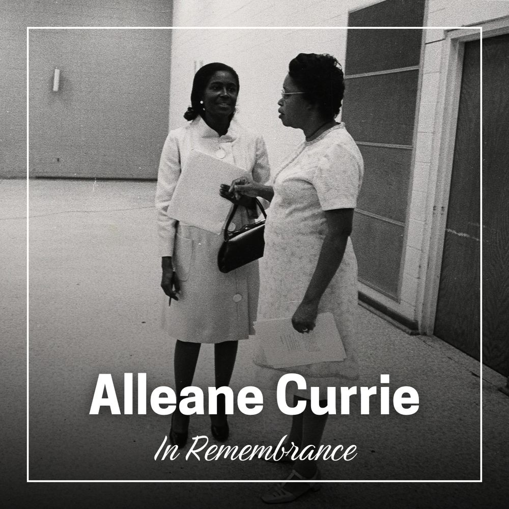 The background is a black and white photo of two women in dresses talking in an empty hallway next to closed doors. They both carry folders and papers.
