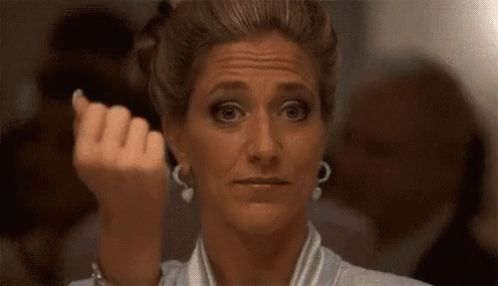 Carmela Soprano beckoning Charmaine Bucco