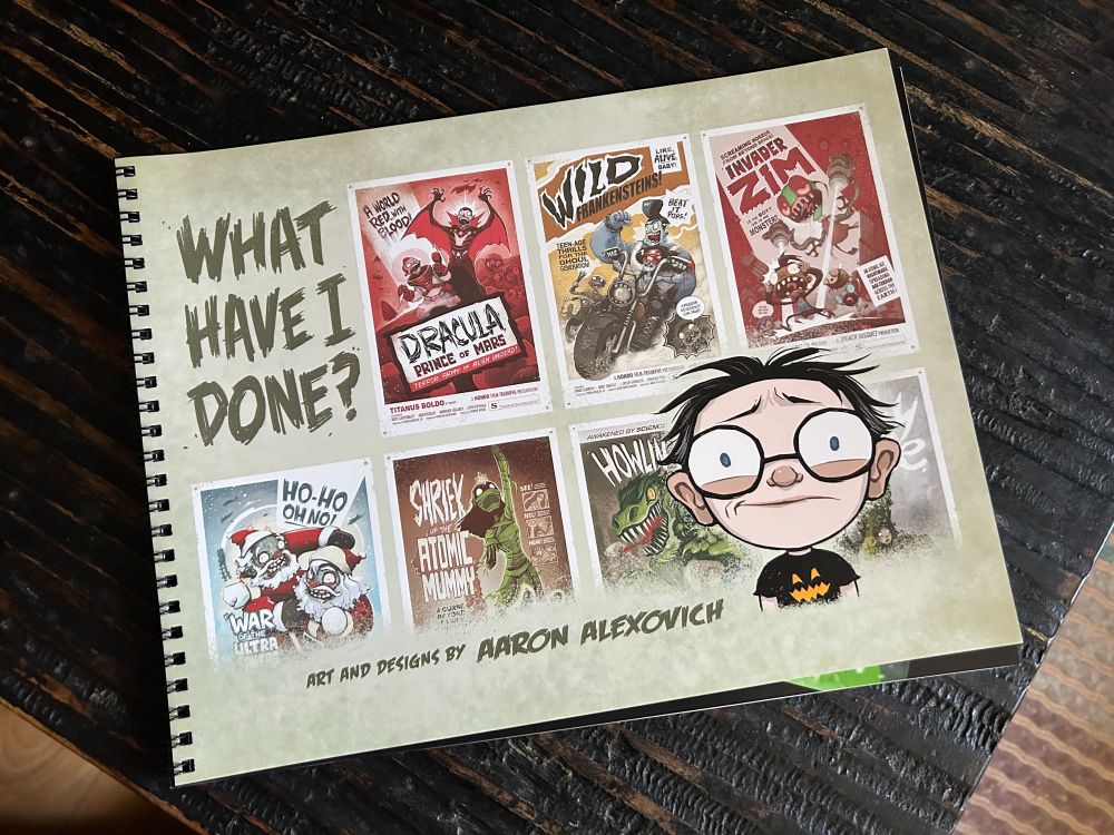 The cover of my new art book, entitled "WHAT HAVE I DONE." It shows an anxious cartoon version of me standing in front of a bunch of cool monster posters.