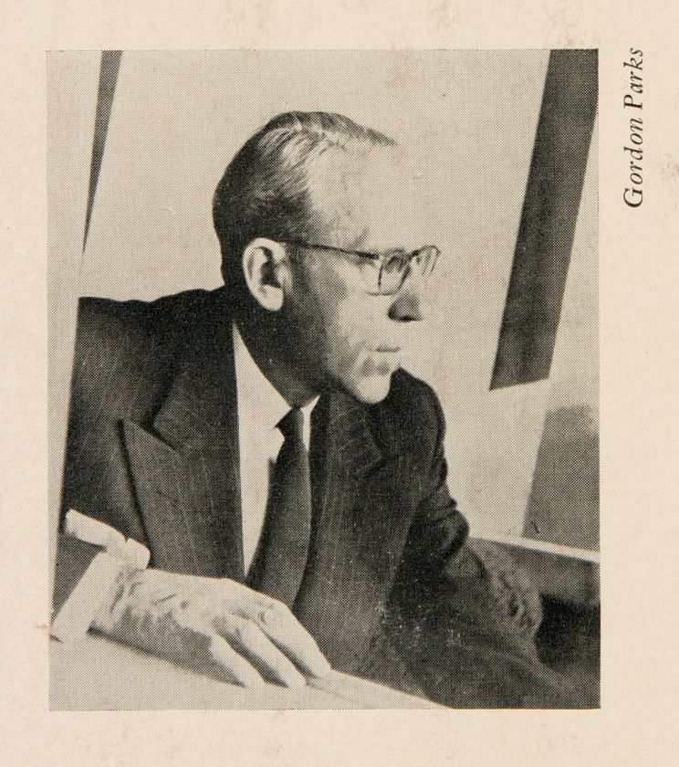 A photo of Fredric Wertham, bespectacled asshole.
