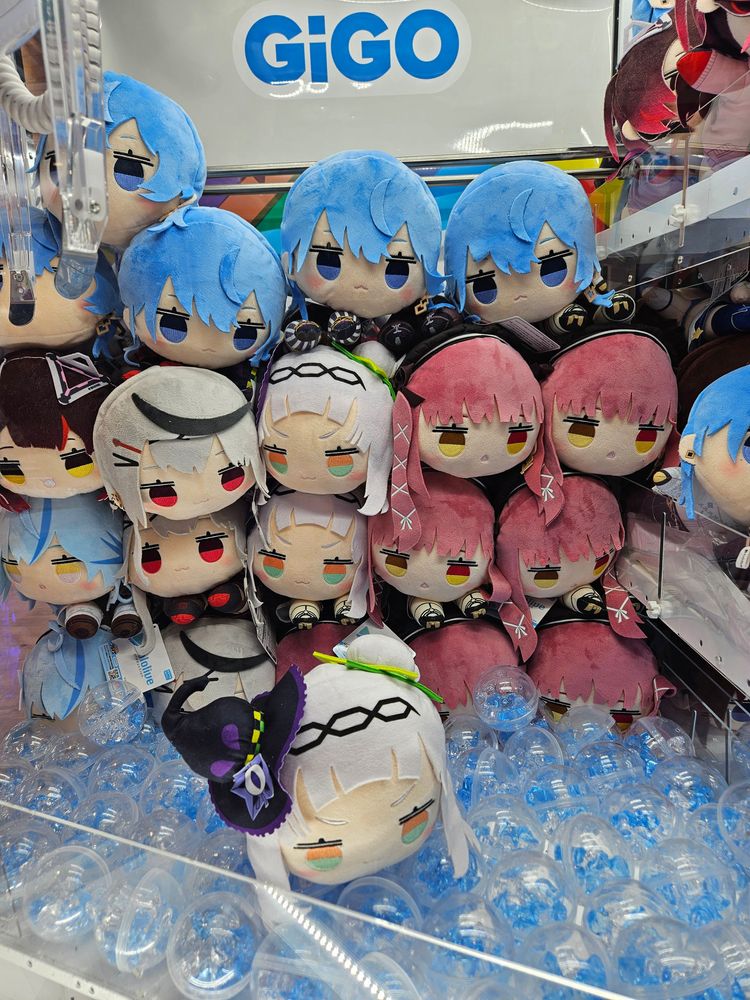 Crane game featuring various hololive plushies in bean shape.