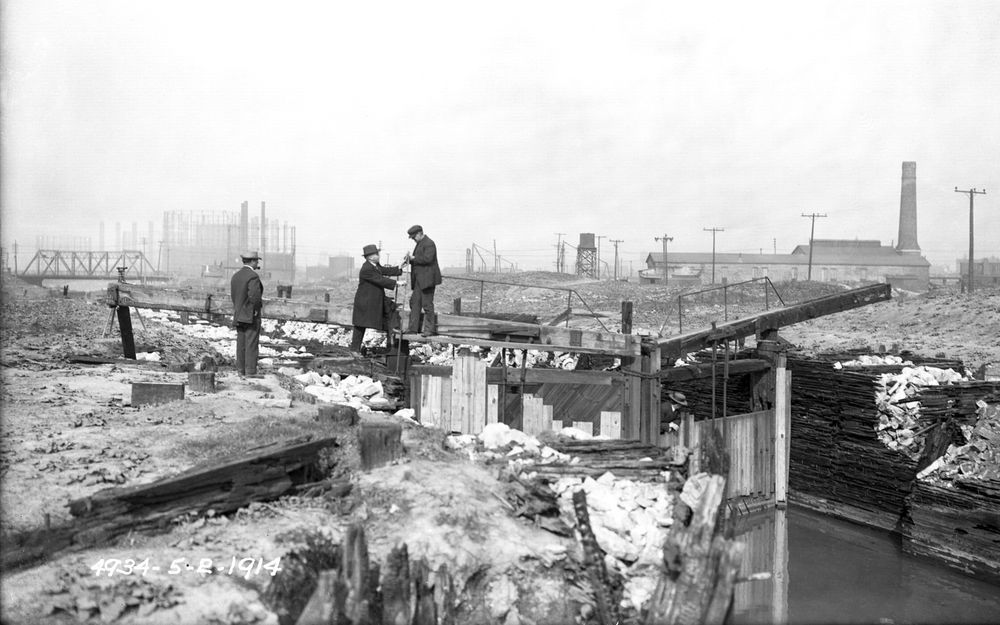 Inspection of the west gate of the Illinois and Michigan (I&M) Canal lock near Ashland Avenue in the Bridgeport neighborhood of Chicago on May 2, 1914. In the years after the Chicago Sanitary and Ship Canal was completed, the I&M Canal became obsolete with shallow, stagnant water. Eventually, Interstate 55 was built on the canal right-of-way between Bridgeport and Summit. Learn about the work of the MWRD on our YouTube channel: https://youtu.be/__yXMrBYek4
