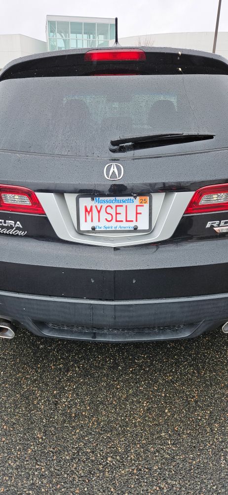License plate reads "Myself"