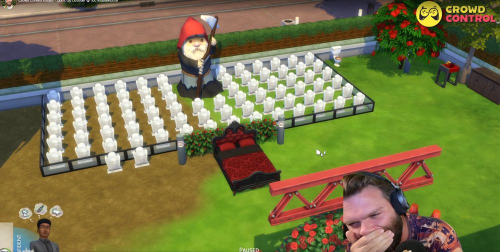 sims 4 yard with a cemetery featuring several rows of tombstones and a giant gnome in a reaper costume. Robo is in the corner laughing. The crowd control logo is in the top right.