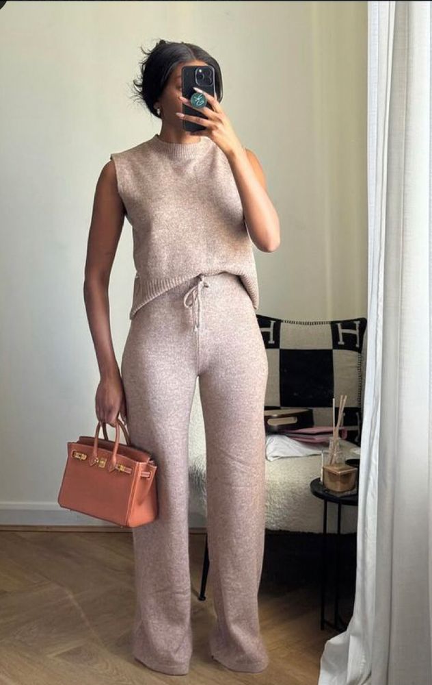 Woman wearing Sleeveless sweater knit outfit