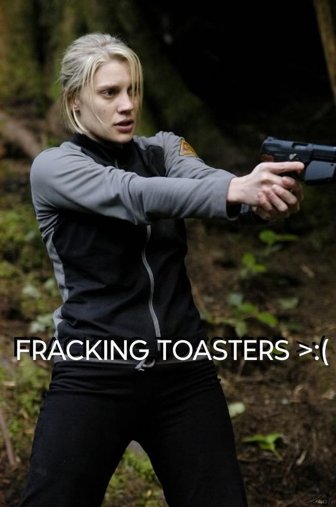Starbuck / Kara Thrace from Battlestar Galactica, pointing a gun at some adversary off-screen, with the caption "FRACKING TOASTERS"