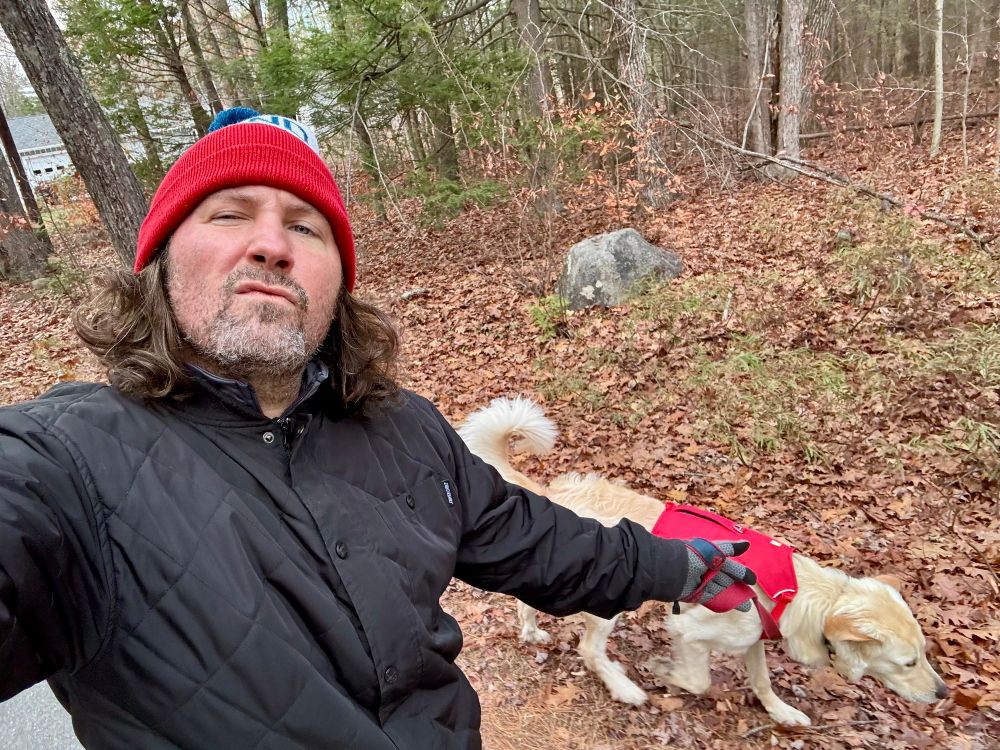 A selfie of me and the dog as we test out his fancy new harness. I decided to wear a matching winter hat (with pompom) because it's important to look professional when you're doing the neighborhood watch rounds 