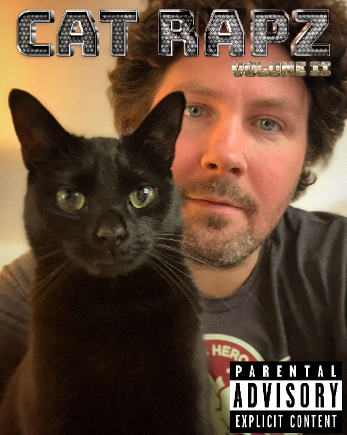 A photo of me standing behind my black cat Sydney made to look like a hiphop mixtape. "Cat Rapz: Volume II" is printed at the top in glittery Cash Money lettering, and an explicit lyrics stamp is at the lower right-hand corner