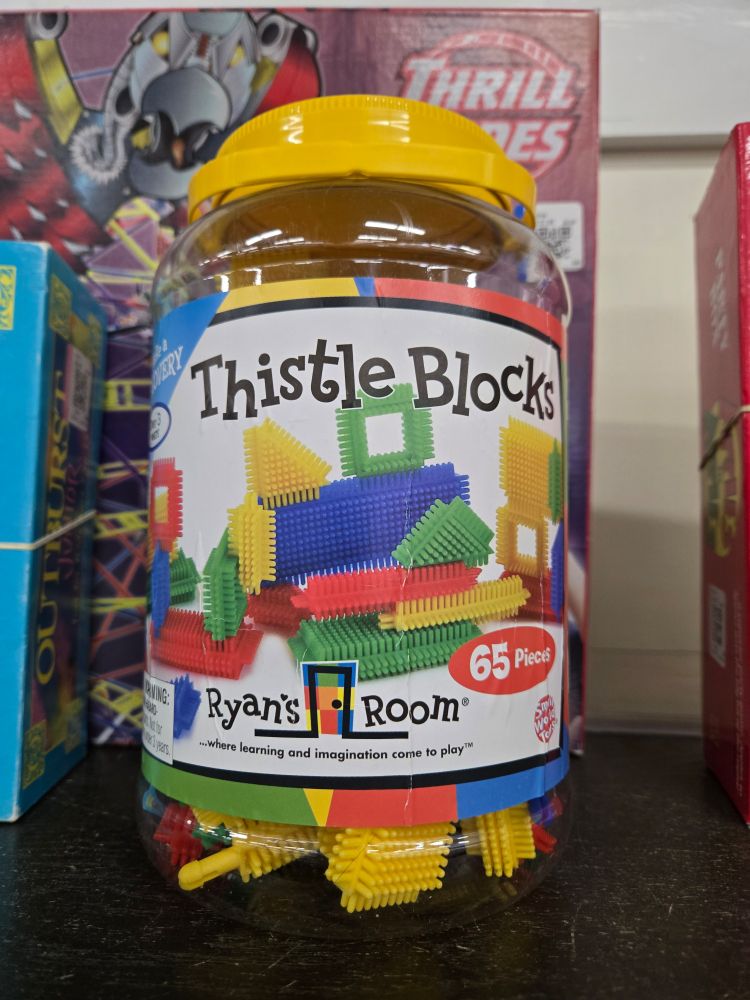 A plastic jug of thistle blocks. Those plastic blocks with dense pegs on all side that you can press together.