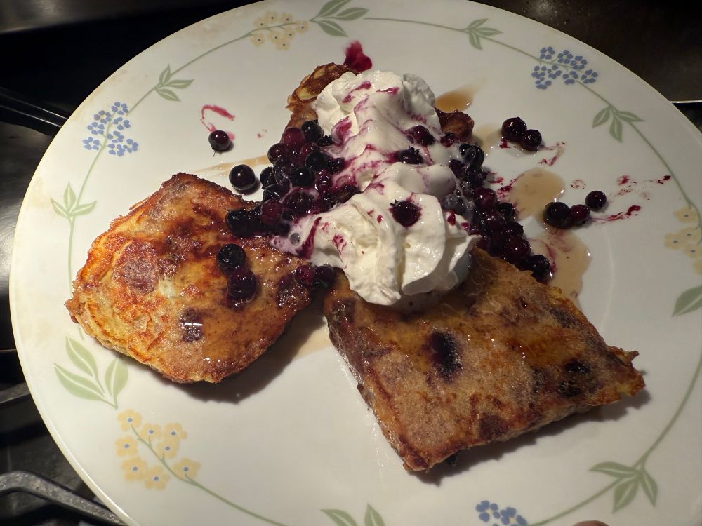 French toast with Maine maple syrup, vanilla, nutmeg, & fresh wild blueberries & whipped cream.