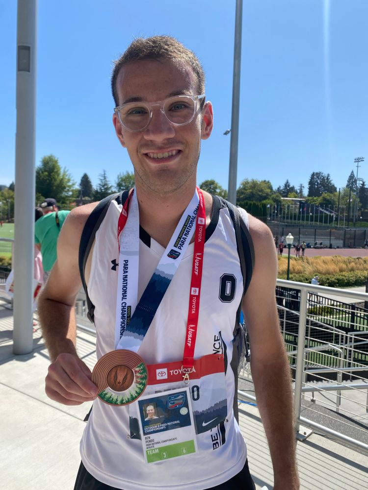 Proudly showing off the beautiful bronze medal won at the ParaNational Track meet.