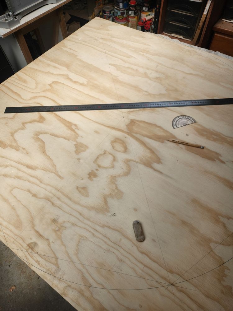 A bad photo of the final drawing of the Octagon on the table top ready for masking and cutting.