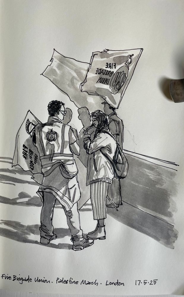 Mono drawing in sketchbook showing group of Fire Brigade Union members holding flags next to a wall. 