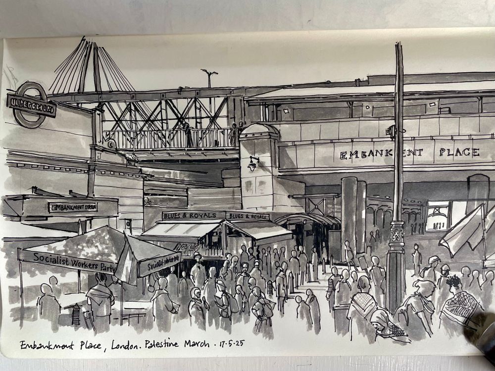 Mono pen and ink sketch in sketchbook of Embankment Place in London. Tube station to the left and Blues and Royals coffee kiosk in the centre. There are stalls with people handing out flags and literature in the foreground. There are lots of figures across the scene. The railway line can be seen running above the scene and an underpass runs underneath with the light from the other end in high contrast. 
