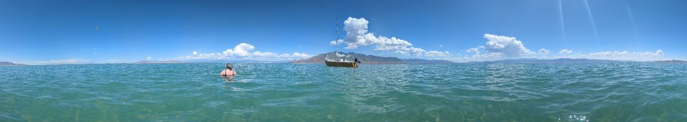 A sailboat at anchor.