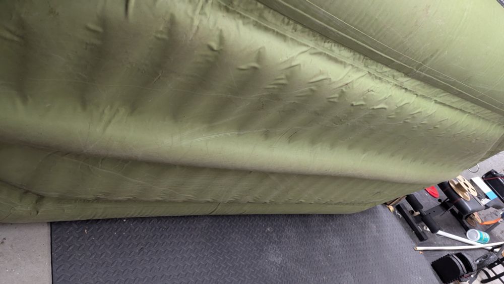 The ribbed bottom side of an 11' inflatable raft.
