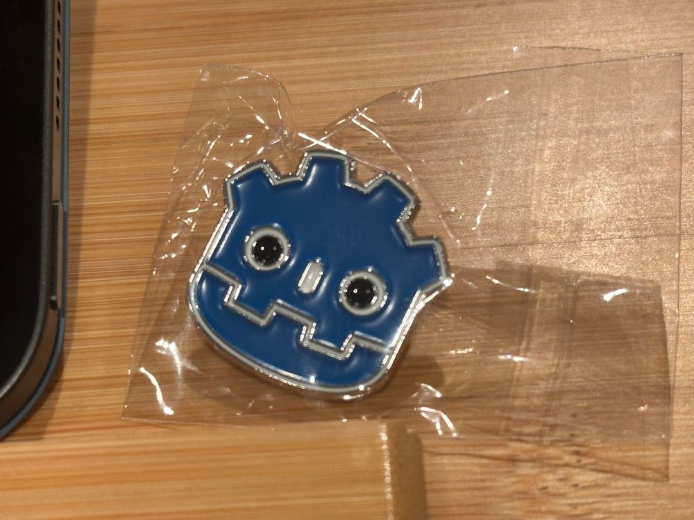 Enamel pin badge featuring the Godot Engine logo