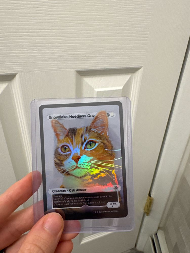 Mtg card of gamer nexus cat and ceo snowflake.