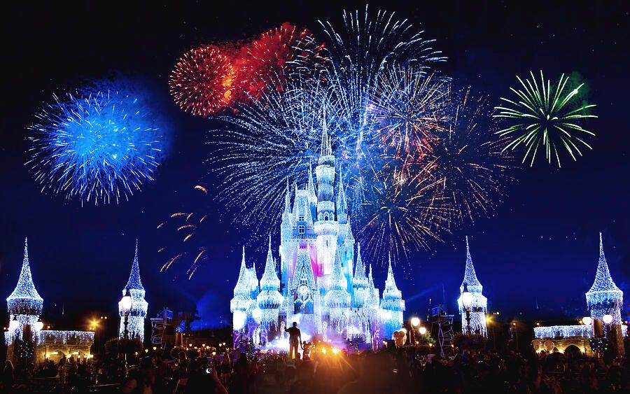 Fireworks over Cinderella Castle in Walt Disney World during the holiday season. 
