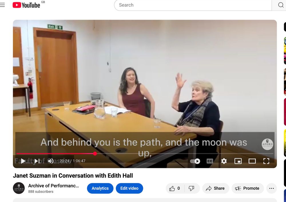 Screenshot of Youtube page showing a video of Janet Suzman and Edith Hall seating at a table in a conference room conversing.
