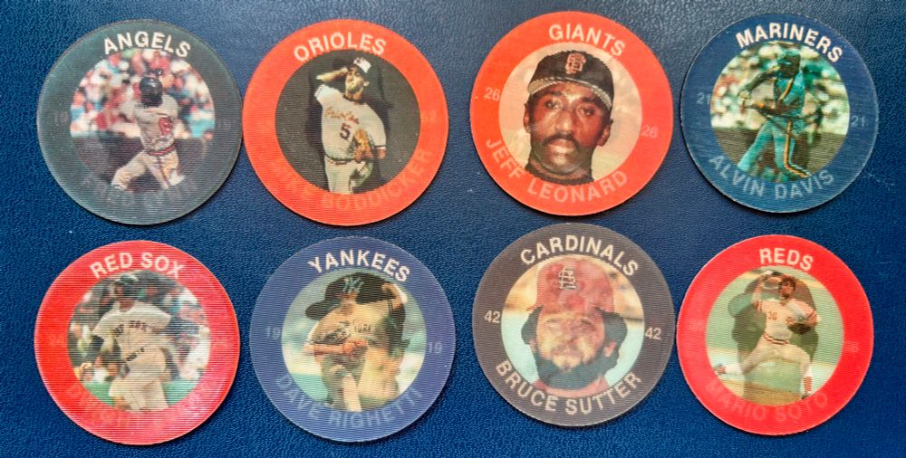 Slurpee coins from 1985: Lynn, Boddicker, Leonard, Davis, Evans, Righetti, Sutter, Soto