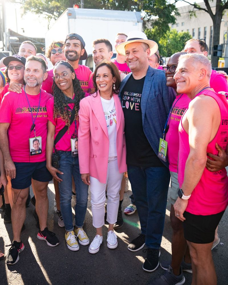 Vice President Harris and Second Gentleman Emhoff stand with staff members of DC Pride in June 2022.