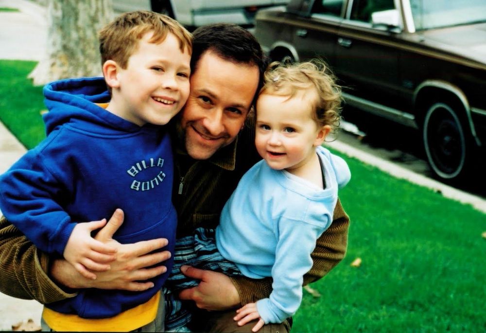 An old photograph of Doug Emhoff with his young children, Cole and Ella.