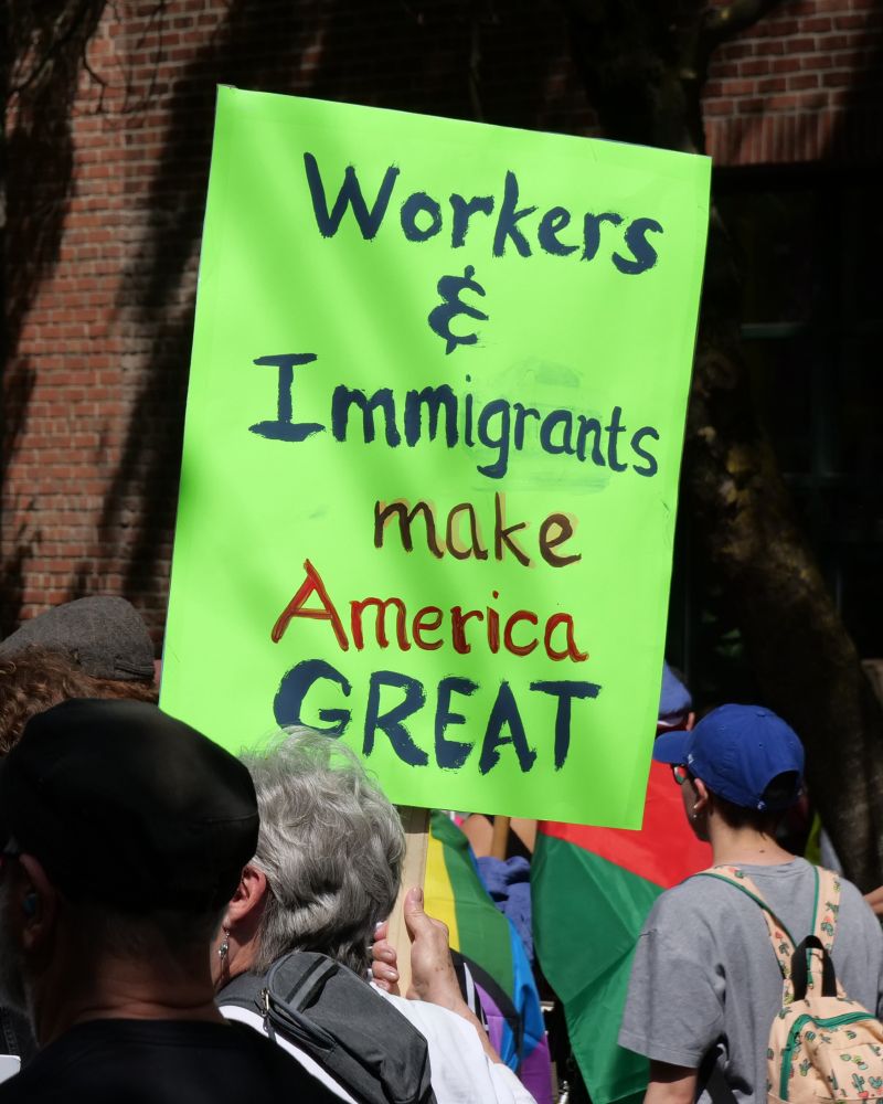 Sign that says Workers & Immigrants make America Great