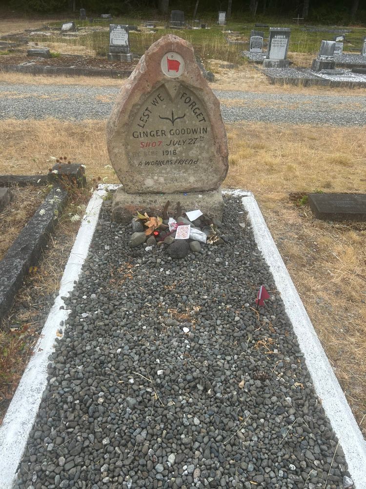 A grave with a headstone that reads “Lest We Forget” Ginger Goodwin shot July 27 1916 (by RCMP) A Workers Friend 