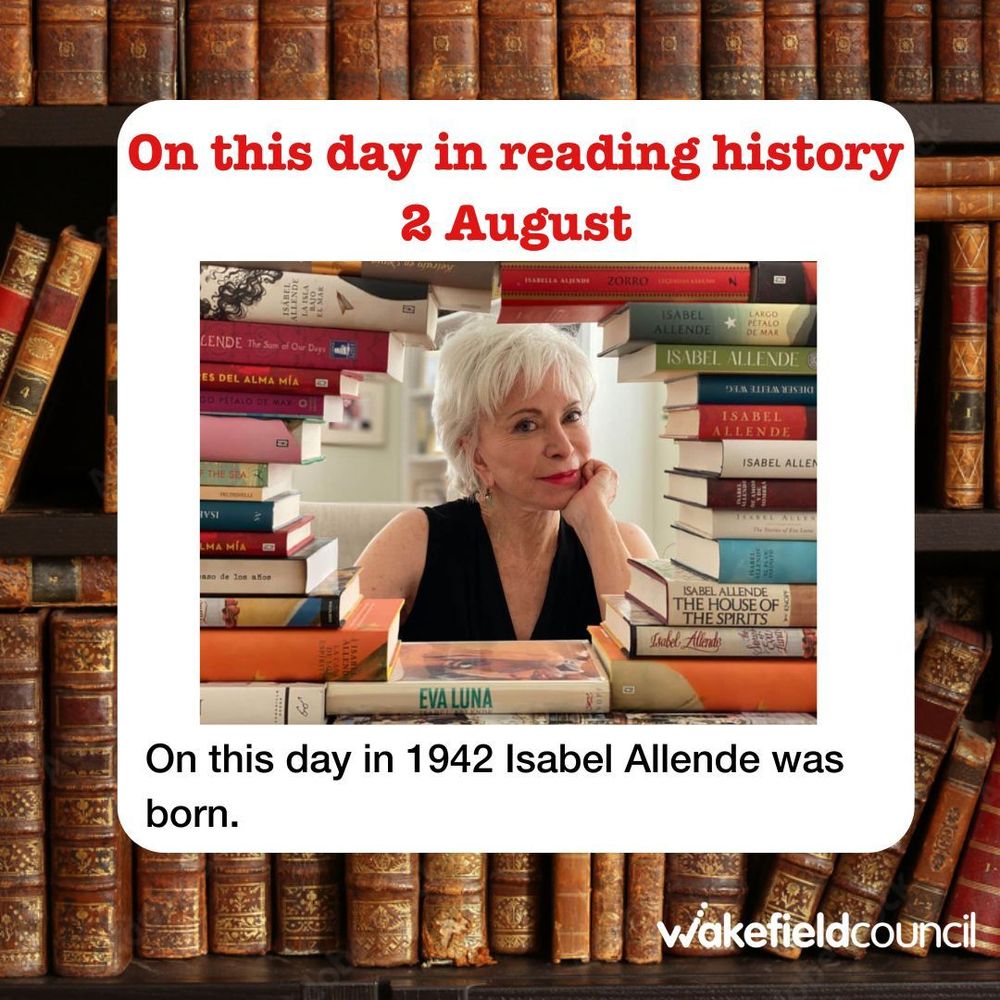 A picture of author Isabel Allende surrounded by books. Text below her reads 'On this day in 1942 Isabel Allende was born'.