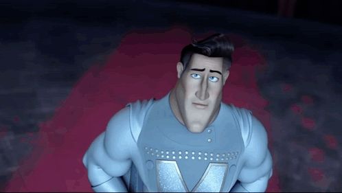 a man in a superhero costume with a letter v on his chest