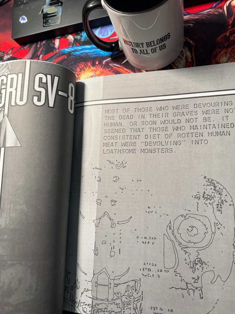 Delta Green Countdown double page spread on a Haunted West mouse pad with a Darker Hue Studio's coffee cup in the background.