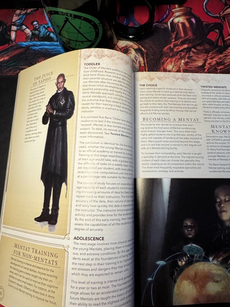  Dune Adventures in the Imperium two page spread on a Haunted West mousepad next to a Delta Green coffee cup.