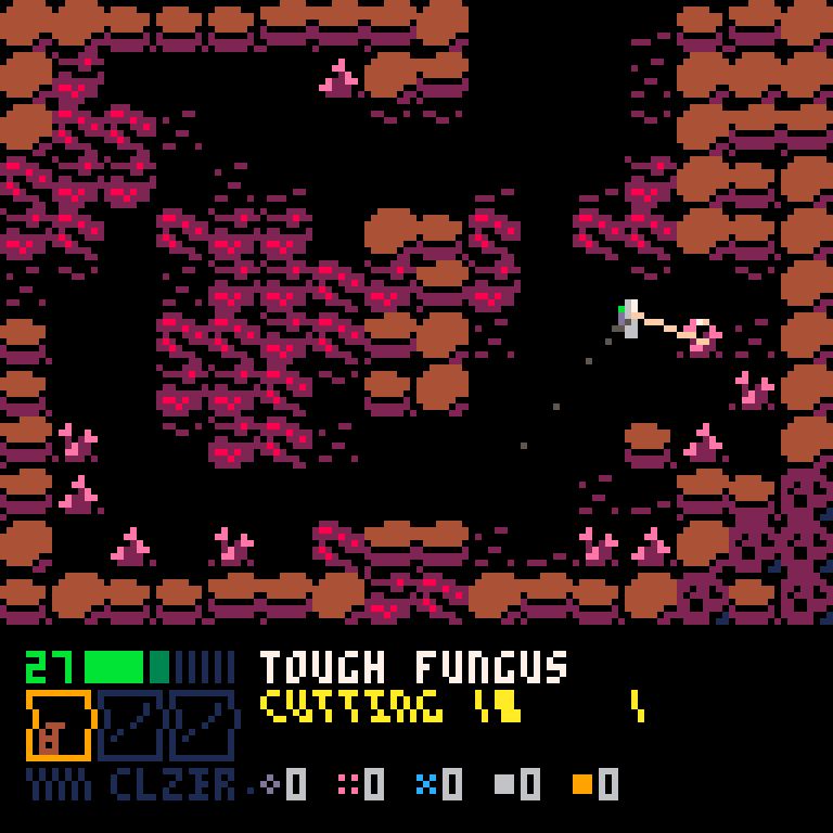 A screenshot of SPHONGOS gameplay. The player is shooting a laser at a mushroom inside a lava cave.
