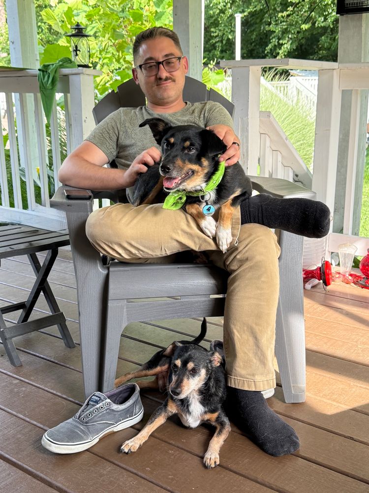 Benji on Robin’s lap with Hans laying under his chair
