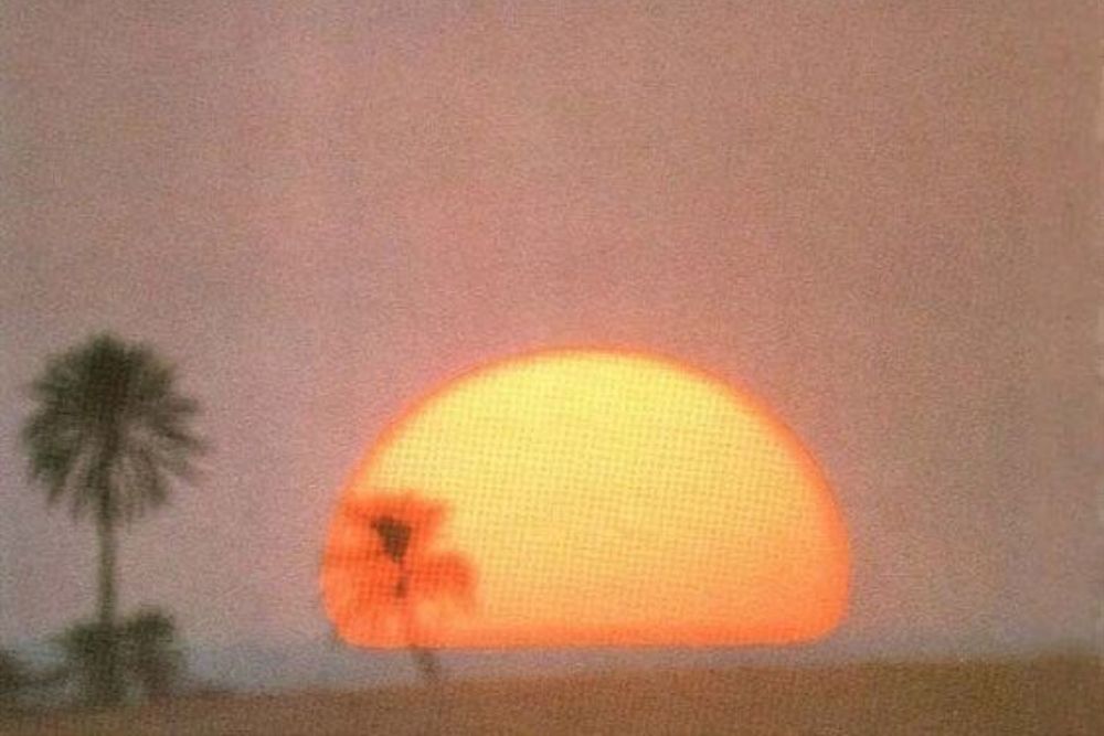 a grainy and blurry image of a sunset, added to make the post look more appealing due to formatting.