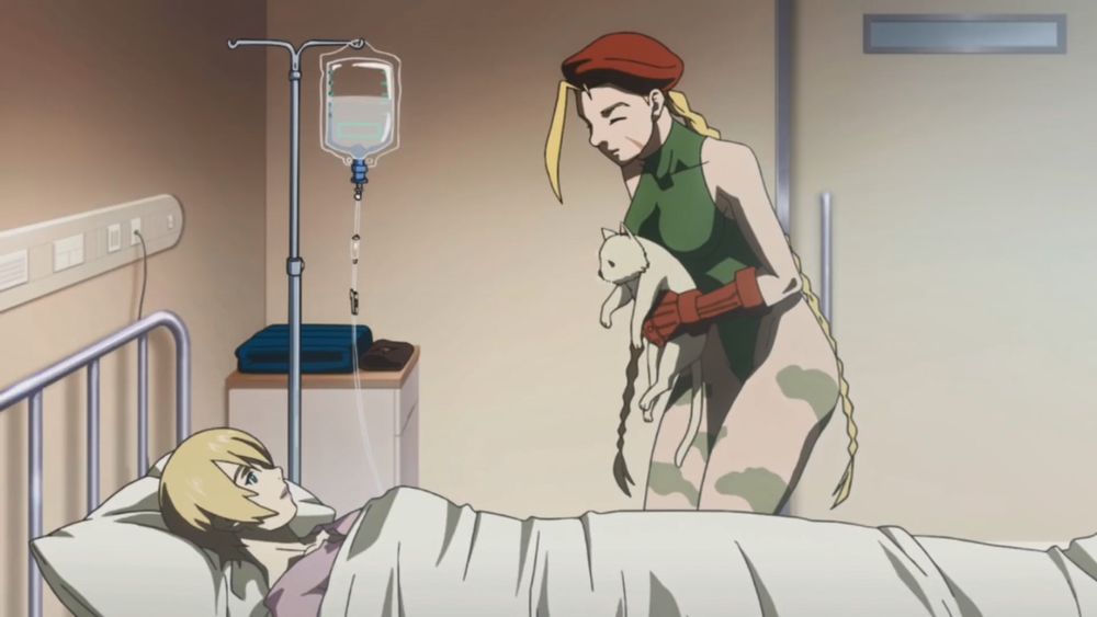 Cammy presenting a cat to Juni