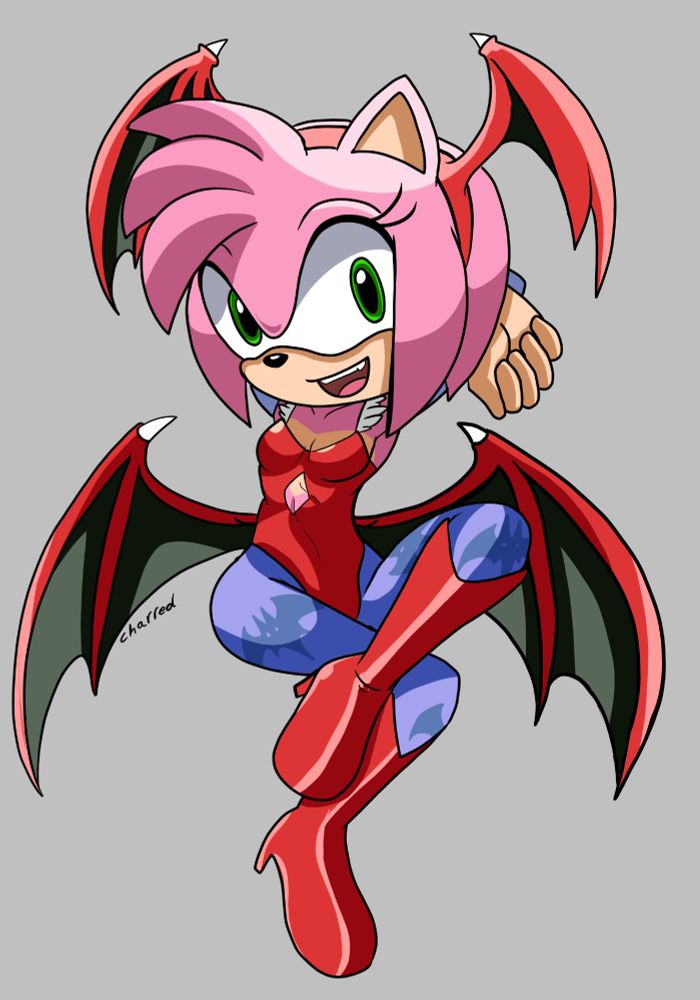 Amy rose from sonic dressed as Lilith Aensland from Darkstalkers / Vampire savior doing her signature winpose.